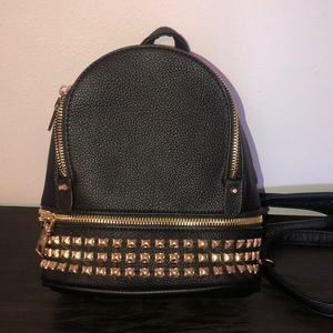 Black gold studded mini backpack